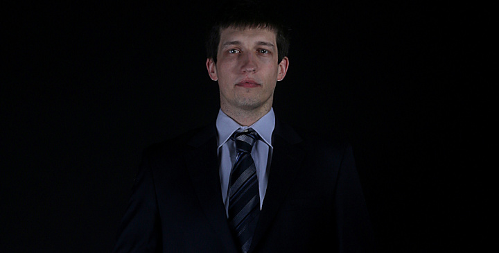 Tomasz Sułkowski in a suit – the software developer